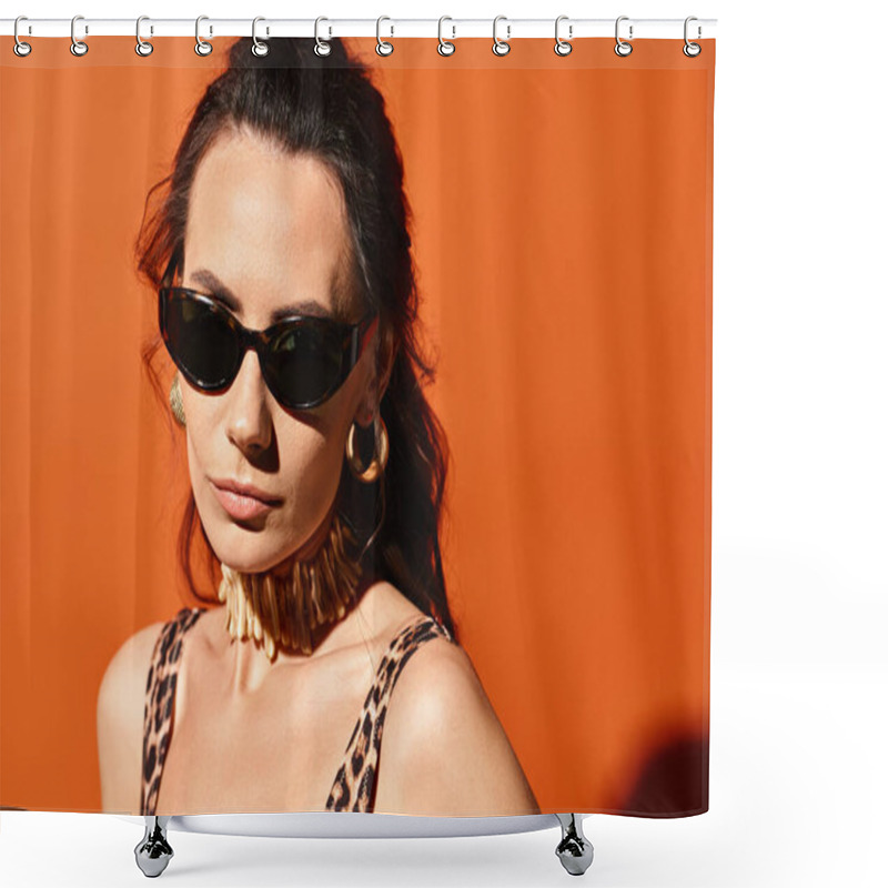 Personality  A Fashionable Woman Wearing Sunglasses And A Leopard Print Top Poses Confidently In A Studio Against An Orange Background. Shower Curtains