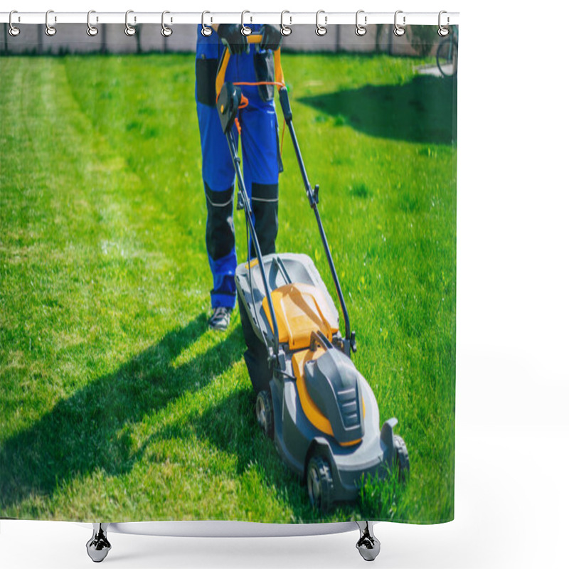 Personality  Young Man Mows The Lawn Using An Electric Lawn Mower In A Special Worker Suit Near A Large Country House In The Backyard Shower Curtains