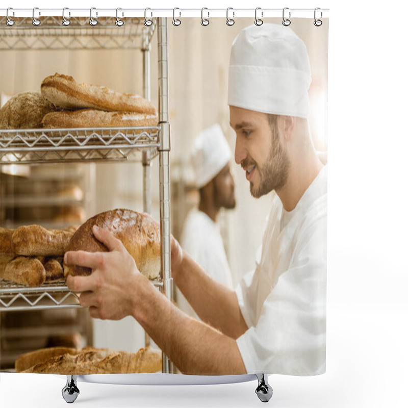 Personality  Handsome Smiling  Baker Putting Fresh Bread Loaf On Shelf At Baking Manufacture Shower Curtains