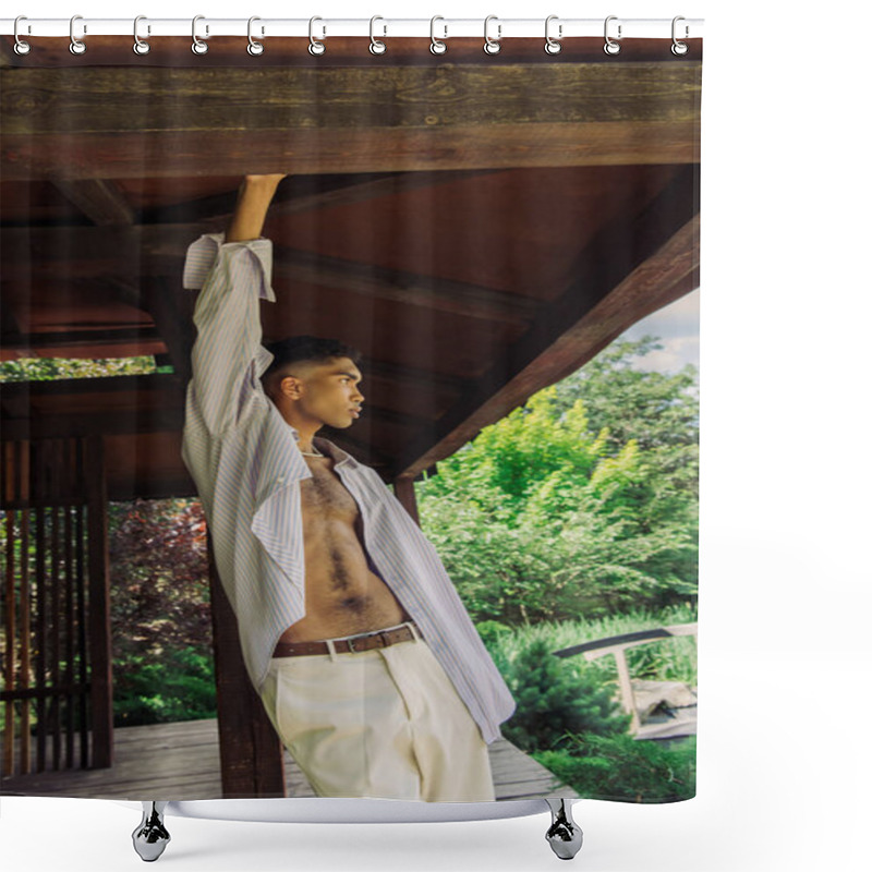 Personality  Young African American Man In Striped Shirt Looking Away While Standing In Wooden Gazebo With Raised Hand Shower Curtains