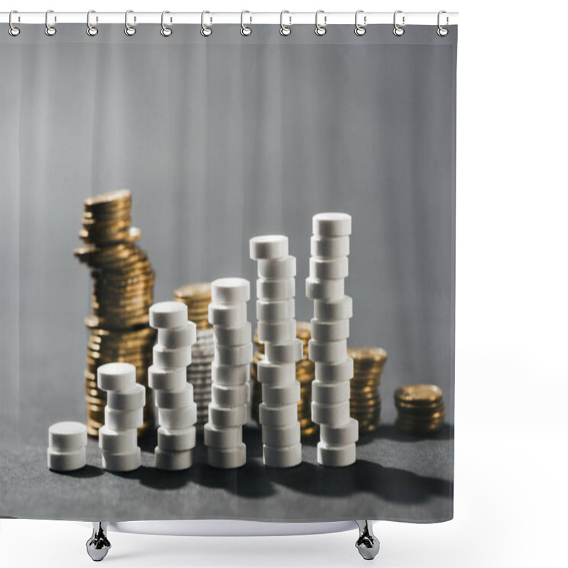 Personality  Selective Focus Of Arranged Stacks Made Of White Pills And Coins On Grey Shower Curtains