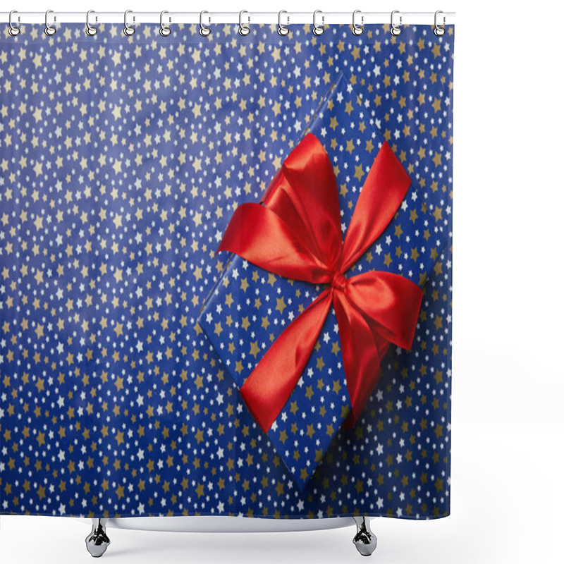 Personality  Top View Of Wrapped Gift Box With Red Ribbon On Festive Wrapping Paper With Stars Pattern Shower Curtains