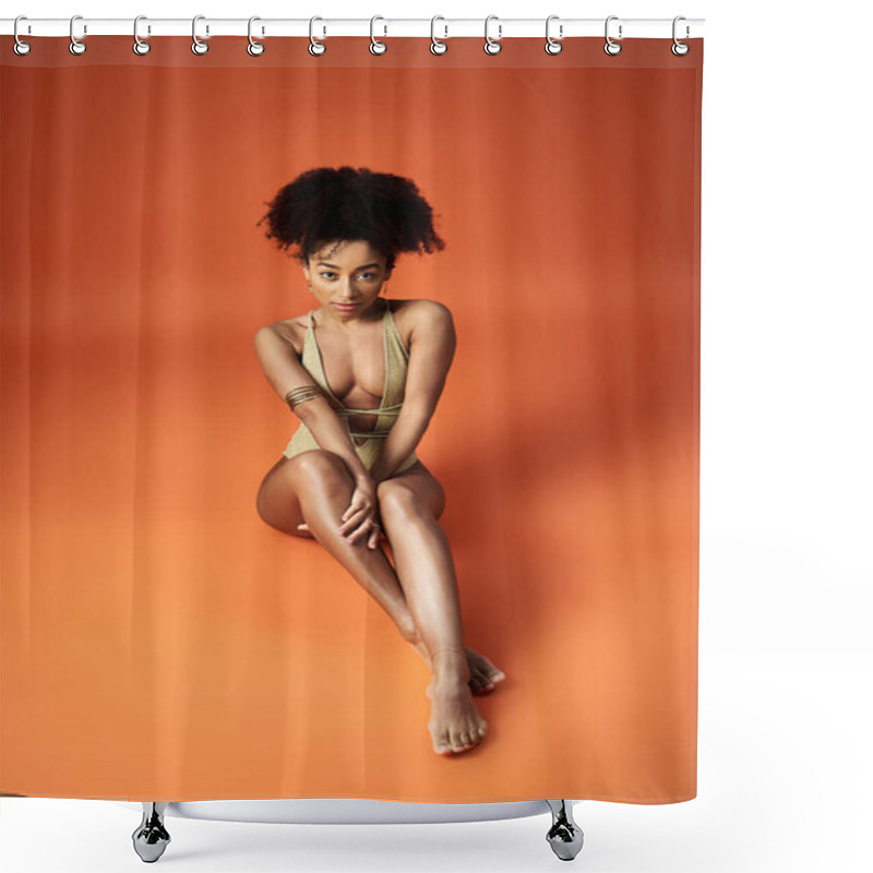 Personality  Stylish African American Woman In Trendy Swimsuit Seated On Vibrant Orange Backdrop. Shower Curtains