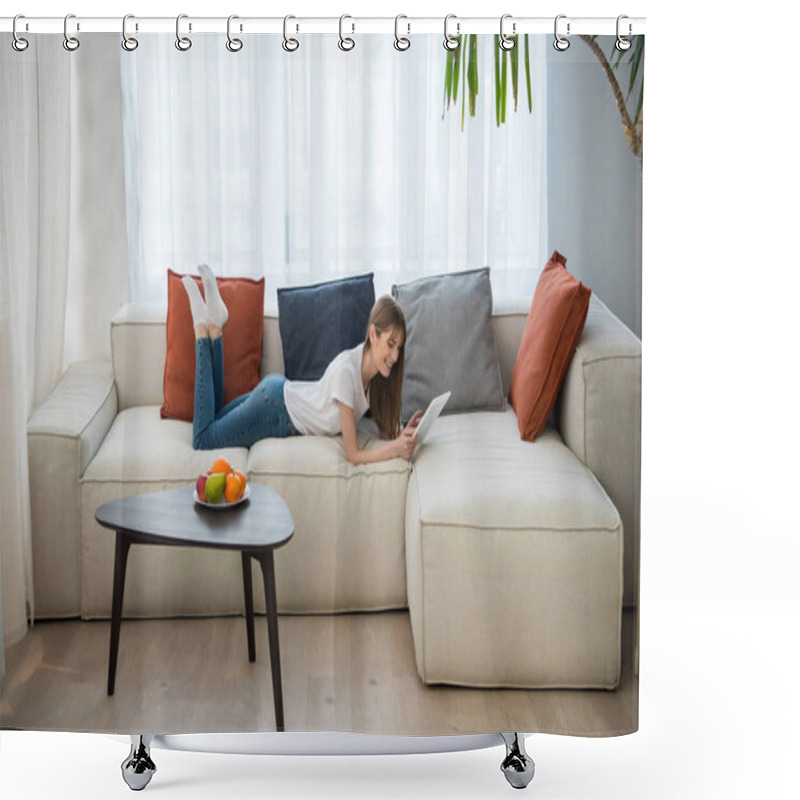 Personality  Side View Of Young Female Lying On Couch And Using Digital Tablet In Living Room With Modern Interior Shower Curtains