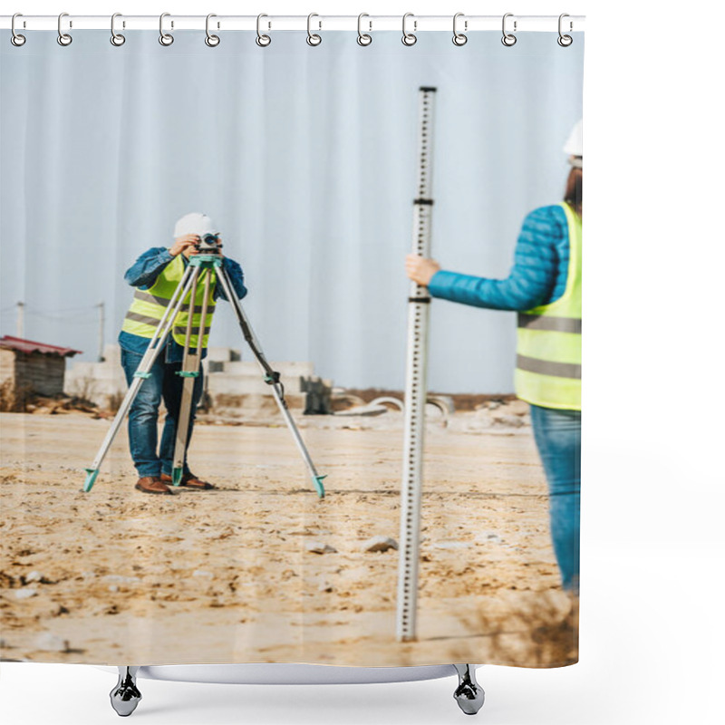 Personality  Selective Focus Of Surveyors Working With Ruler And Digital Level On Construction Site Shower Curtains