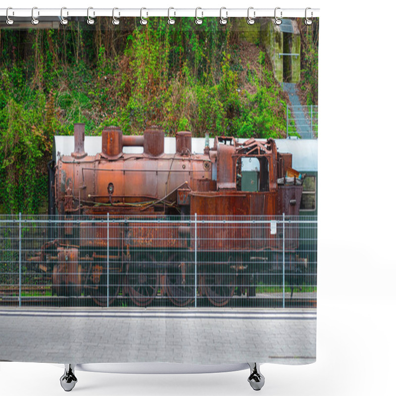 Personality  An Old Steam Locomotive, Covered In Rust, Stands Behind A Metal Fence Surrounded By Lush, Overgrown Vegetation. The Scene Evokes Nostalgia And The Heritage Of The Industrial Era. Shower Curtains