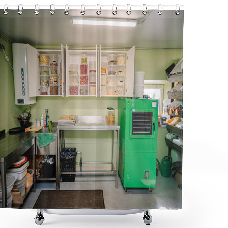 Personality  A Well-organized Garage Space With A Large Green Freeze-dryer, Metal Worktable, And Cabinets Filled With Jars Of Freeze-dried Fruits And Supplies. Shower Curtains