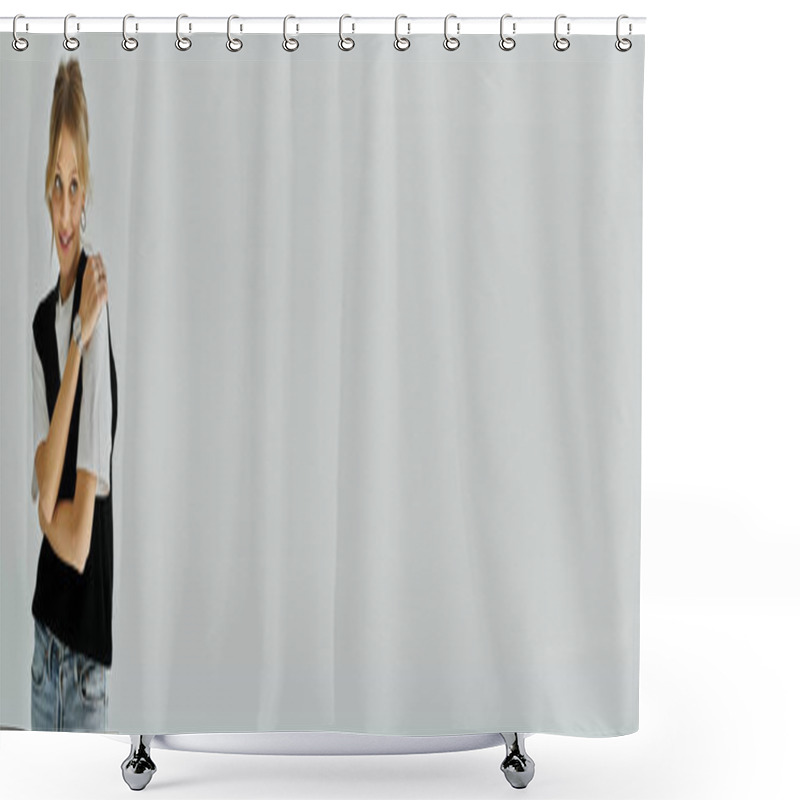 Personality  Beautiful Young Woman With Blonde Hair Poses In Stylish Black Shirt And Jeans Attire Against A Grey Background. Shower Curtains