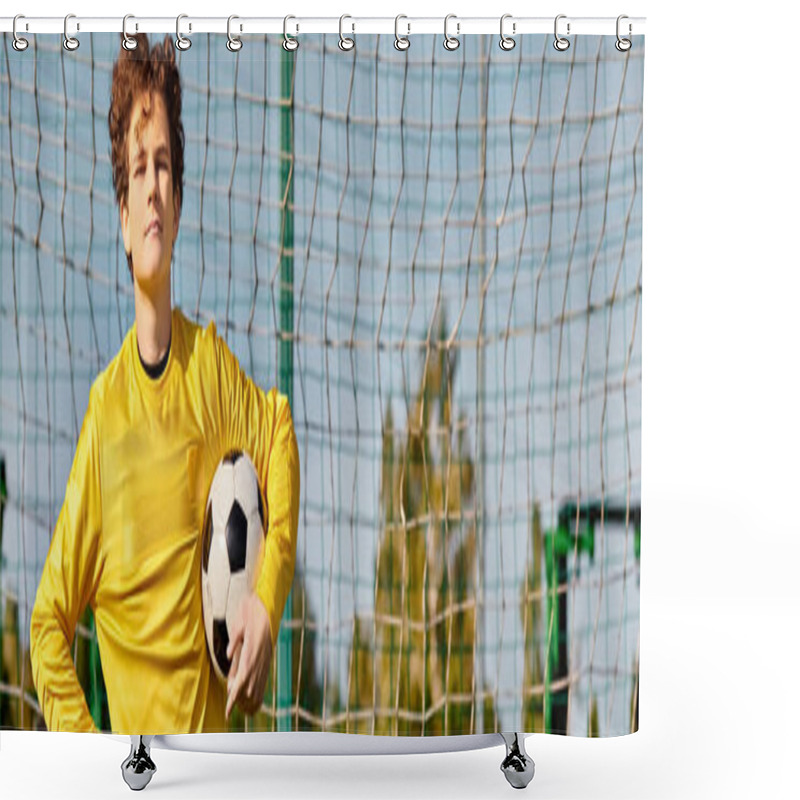 Personality  A Young Man Confidently Holds A Soccer Ball In Front Of A Net, Ready To Take A Shot. The Anticipation And Intensity Of The Moment Are Palpable As He Prepares To Aim For The Goal. Shower Curtains