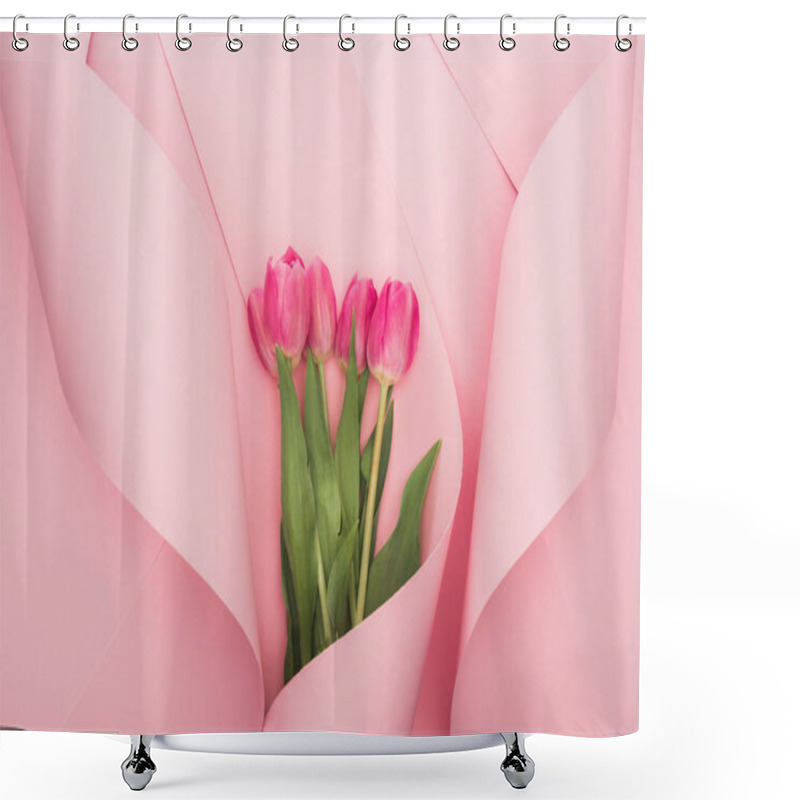 Personality  Top View Of Pink Tulips Wrapped In Paper Spiral Swirls On Pink Background Shower Curtains