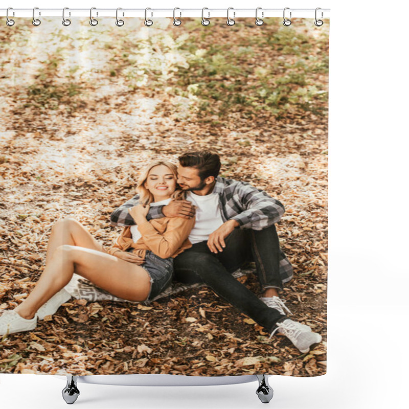 Personality  Happy Man Embracing Cheerful Girlfriend While Sitting On Fall Foliage In Park Shower Curtains