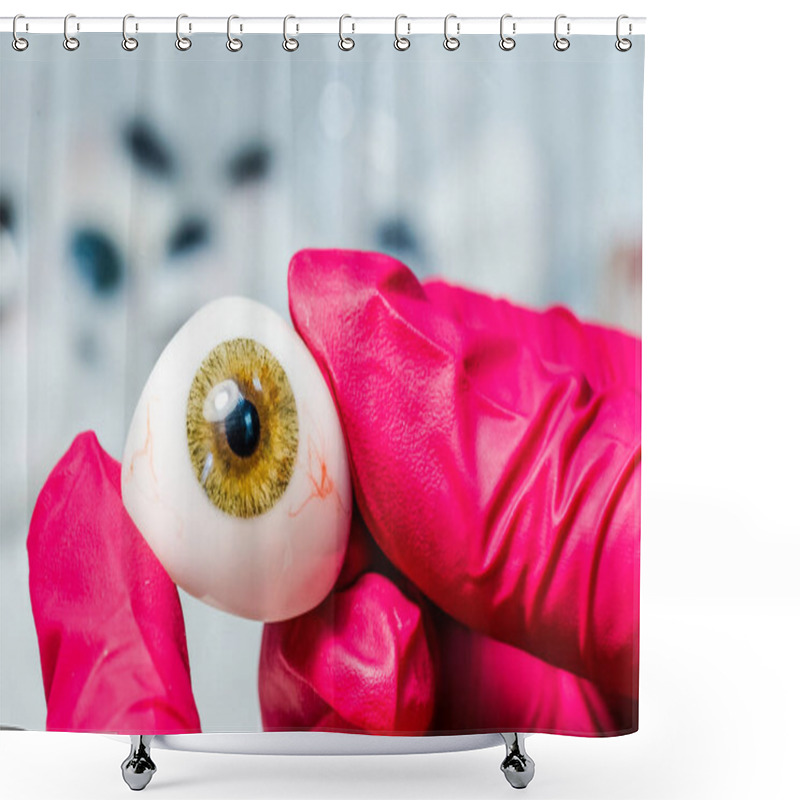 Personality  Ophthalmologist Or Surgeon Holds An Eye, Eyeball Prosthesis In Hands. Concept Photo For Ocular Prosthesis. Surgical Operations On Eyes. Closeup. Shower Curtains