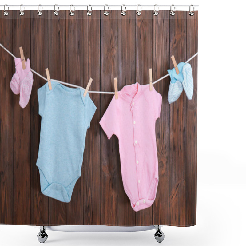 Personality  Children's Clothes On Laundry Line Against Wooden Background Shower Curtains