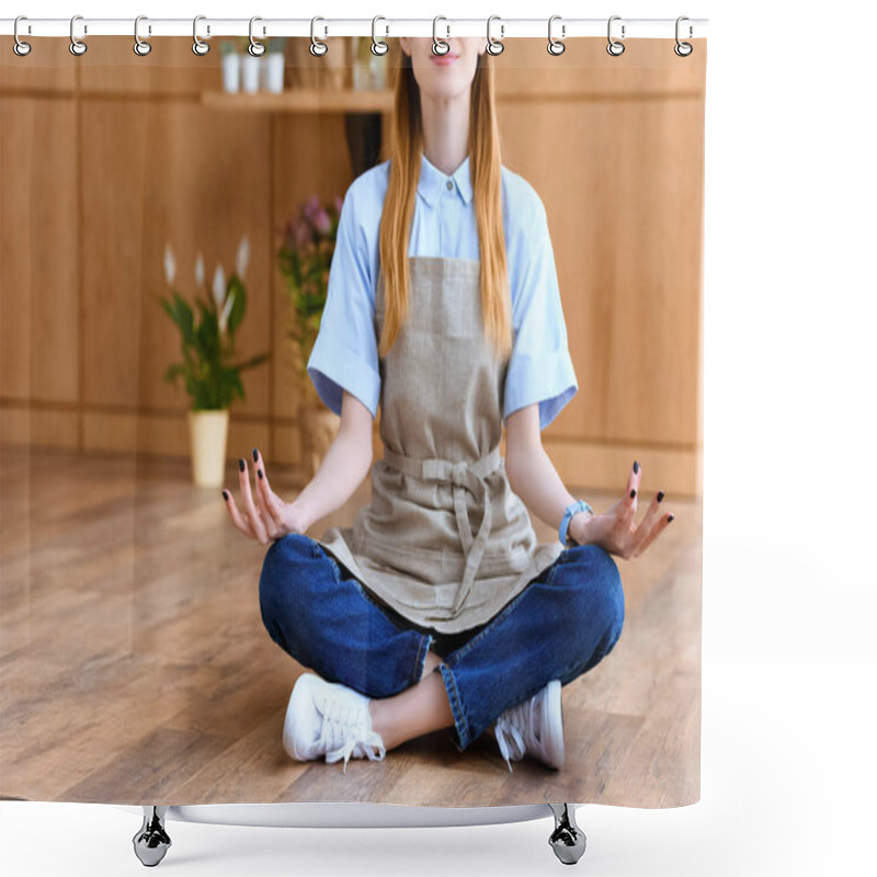 Personality  Cropped Shot Of Smiling Young Florist In Apron Sitting In Lotus Position On Floor  Shower Curtains