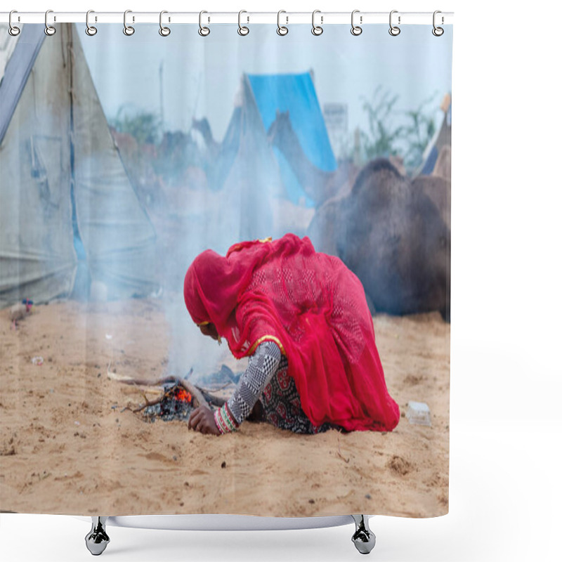 Personality  PUSHKAR, RAJASTHAN / INDIA - NOVEMBER 2019 : Portrait Of Indian Woman In Ethnic Colorful Rajasthani Dress Blowing Fire To Get Warm In Pushkar Camel Fair Ground Shower Curtains