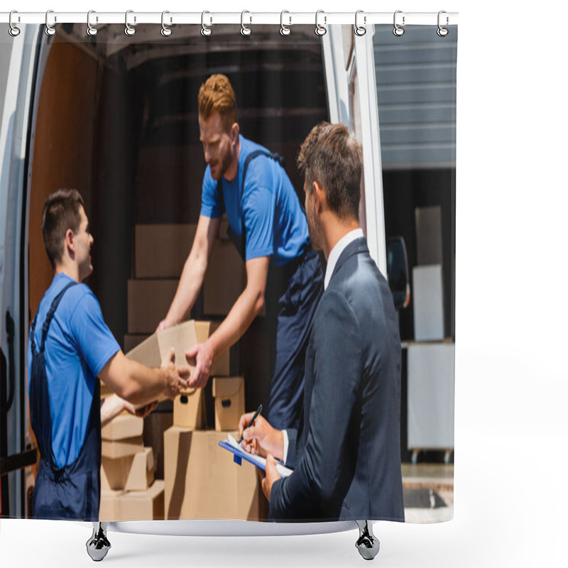 Personality  Selective Focus Of Businessman Holding Pen And Clipboard While Movers Unloading Packages From Truck Outdoors  Shower Curtains