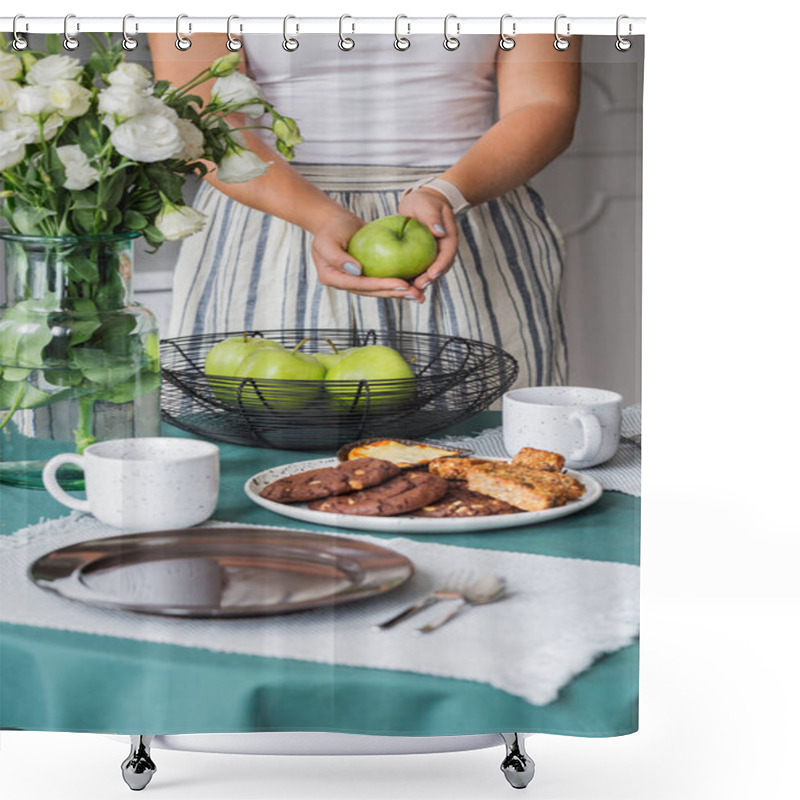 Personality  Woman With Green Apple In Her Hands Standing Next To Kitchen Table With Cookies On Plate And Coffee Mugs Shower Curtains