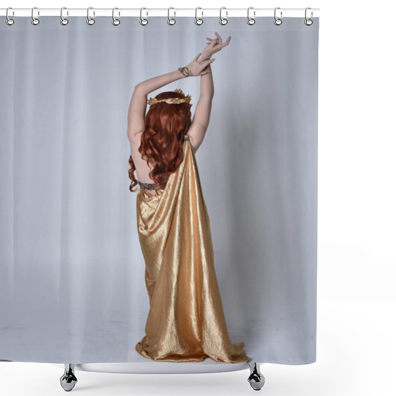 Personality  Full Length Portrait Of Girl With Red Hair Wearing Long Grecian Toga And Golden Wreath. Standing Pose With Back To The Camera,  Isolated Against A Grey Studio Background. Shower Curtains