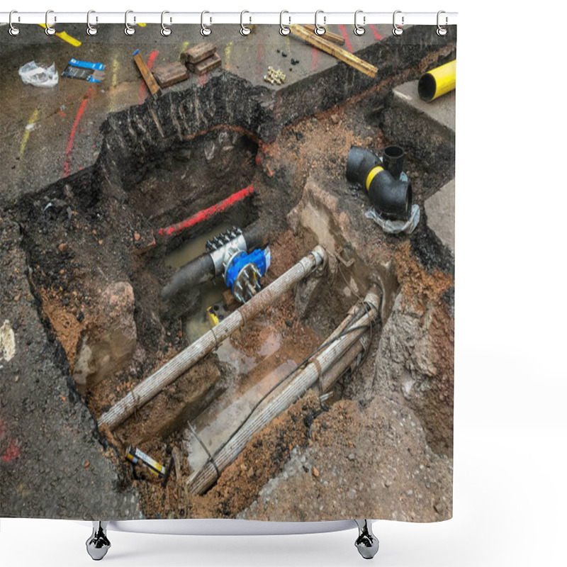 Personality  PONTYPRIDD, WALES - JUNE 2019: Large Trench Dug In Road To Install A New Valve In A Gas Main. Other Utility Pipes And Cables Can Be Seen Under The Road Surface. Shower Curtains