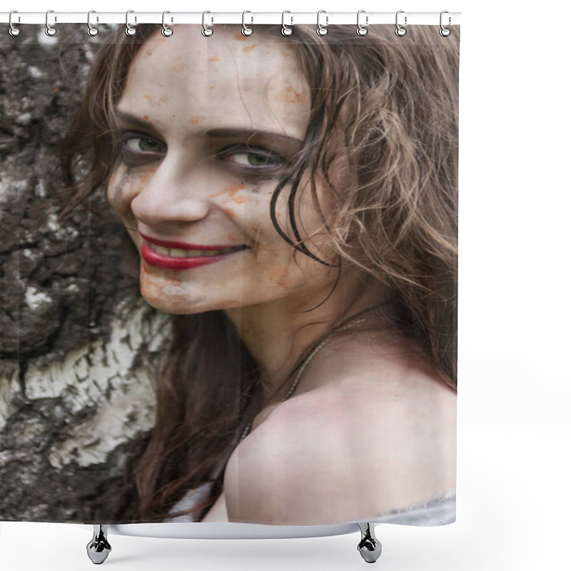 Personality  Beautiful Young Dirty Smiling Mad And Manic Looking Girl Wearing Torn Clothes And Smeared With Mud And Dried Blood Stands And Huddles To A Tree In The Forest. Copy Space. Concept Design. Shower Curtains