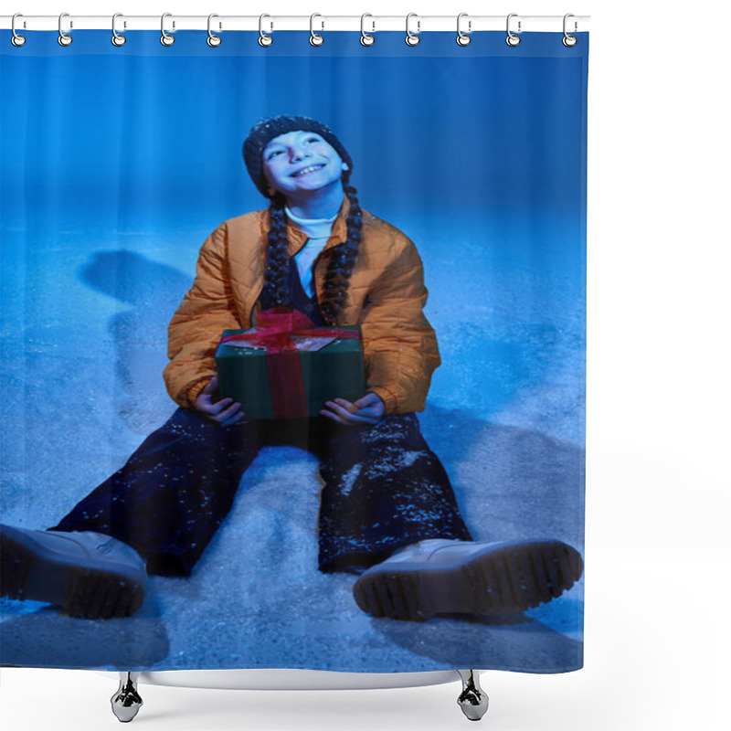 Personality  A Girl With Braids Smiles Warmly While Seated In The Snow, Holding A Beautifully Wrapped Gift. Shower Curtains