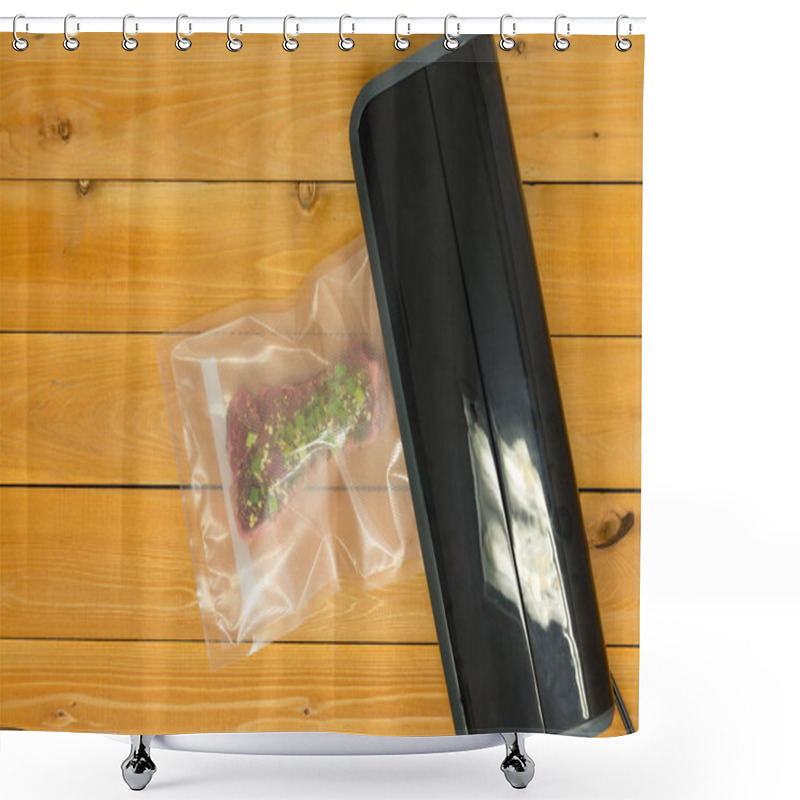 Personality  Sealing A Vacuum Packed Flat Iron Steak In Clear Plastic For Freezing Or Sous-vide Cooking On A Heated Appliance Viewed From Above On A Wooden Table Shower Curtains