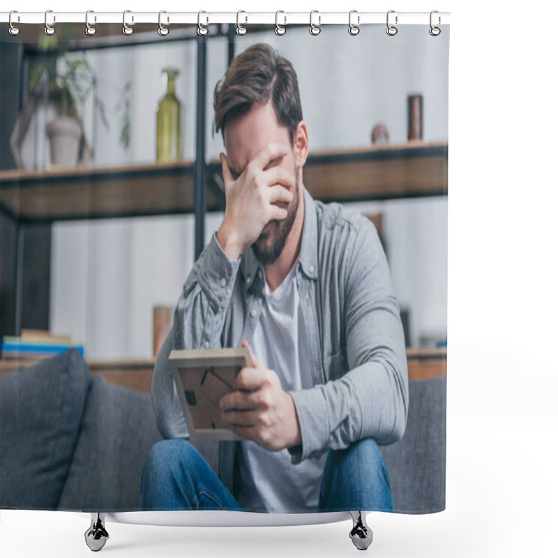 Personality  Upset Man In Gray Shirt Covering Face With Hand And Holding Photo Frame At Home, Grieving Disorder Concept Shower Curtains