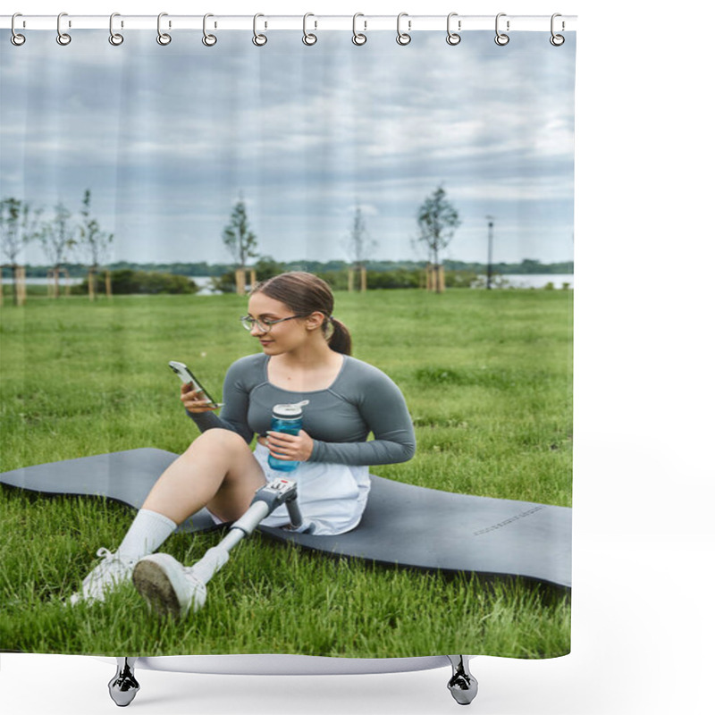 Personality  A Young Woman With A Prosthetic Leg Relaxes On A Mat While Checking Her Phone In A Lush Green Park. Shower Curtains