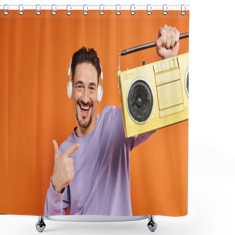 Personality  Bearded Happy Man In Purple Sweater And Wireless Headphones Holding Boombox On Orange Background Shower Curtains