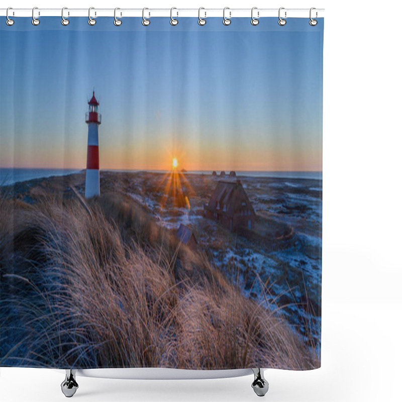 Personality  Red And White Striped Lighthouse Situated On A Coastal Landscape At Sunrise In Winter. Lighthouse West-List On The Ellenbogen (the 