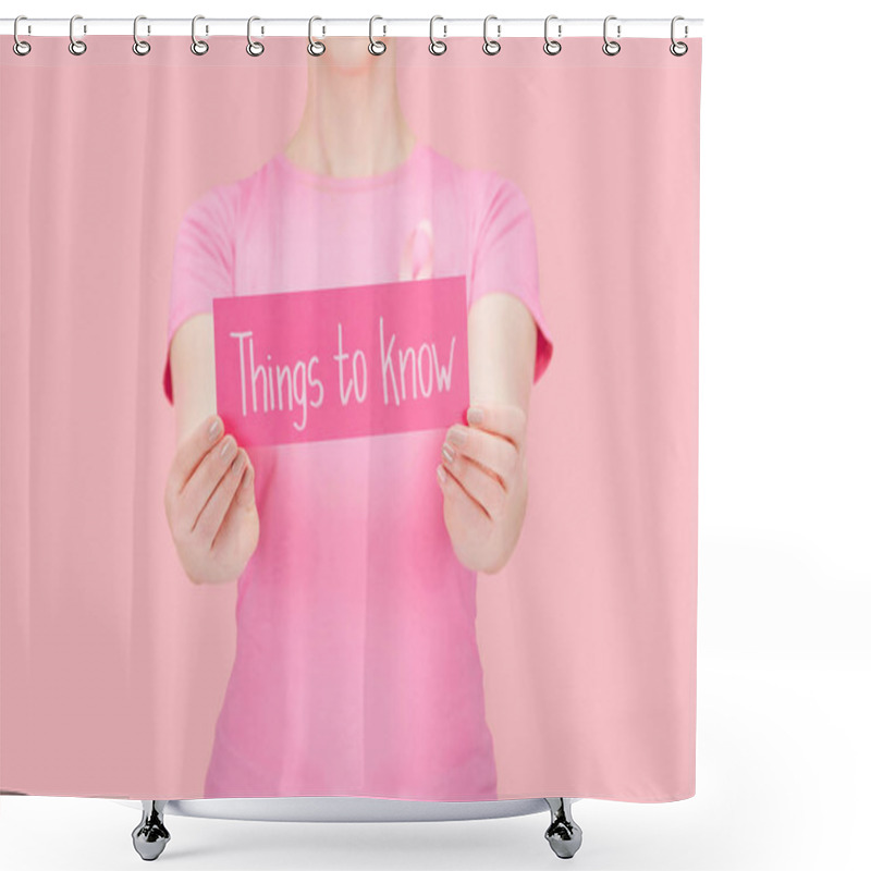 Personality  Selective Focus Of Woman In Pink T-shirt Holding Card With Things To Know Lettering Isolated On Pink, Breast Cancer Concept Shower Curtains