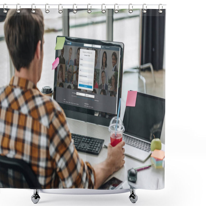 Personality  KYIV, UKRAINE - JULY 29, 2019: Back View Of Young Programmer Holding Glass Of Juice While Sitting At Workplace Near Computer Monitor With Linkedin Website On Screen Shower Curtains