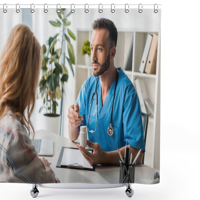 Personality  Selective Focus Of Handsome Doctor Holding Bottle With Pills Near Woman In Clinic  Shower Curtains