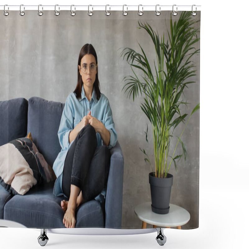 Personality  A Young Woman Is Sitting On The Sofa Looking At The Camera. The Girl Is Worried, Sad. Depression. Shower Curtains