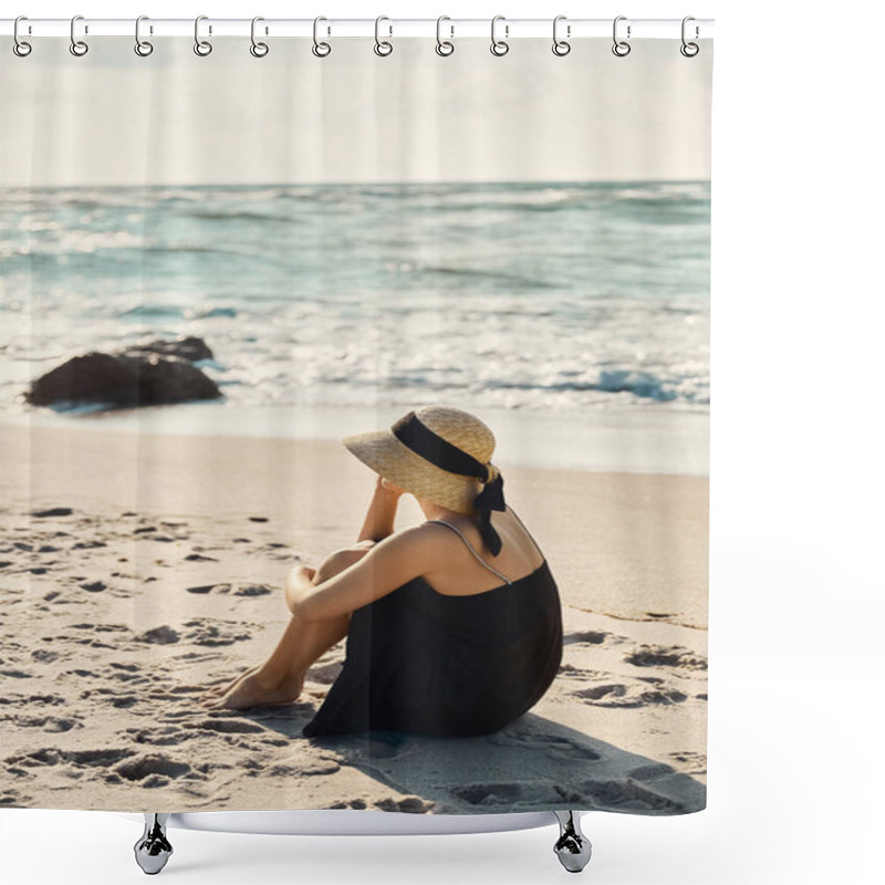 Personality  A Young Woman, Wearing A Black Sundress And Straw Hat, Sits On The Sandy Beach Gazing Out At The Blue Ocean Waves. Shower Curtains