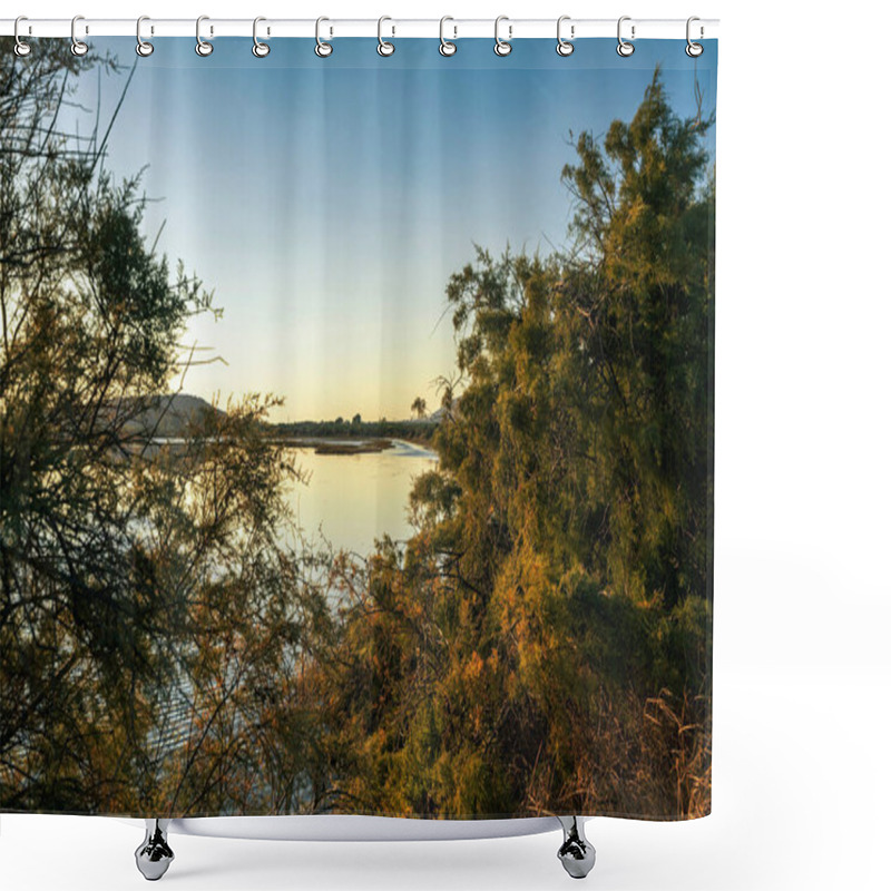 Personality  Sunlight Reflects On The Calm Waters Of Gialova Lagoon In Greece, Surrounded By Bushes And Distant Hills, Creating A Serene Atmosphere. Shower Curtains