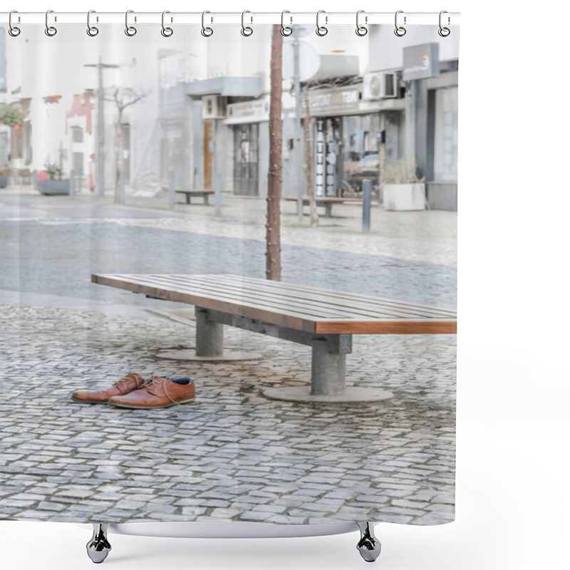 Personality  Brown Leather Shoes On A Cobblestone Pavement Next To A Bench In An Urban Setting. Shower Curtains