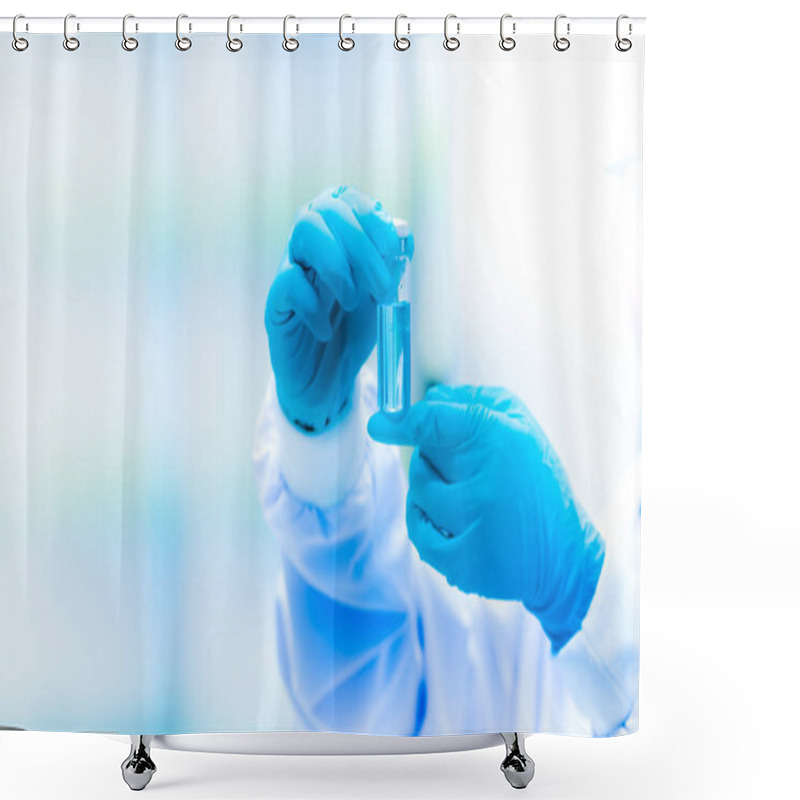 Personality  Hands Of Scientists Wearing Blue Rubber Gloves Experimented With Shower Curtains