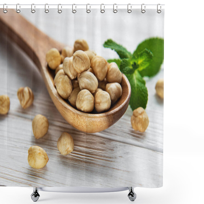 Personality  Peeled Hazelnuts In A Spoon On White Wooden Background Shower Curtains