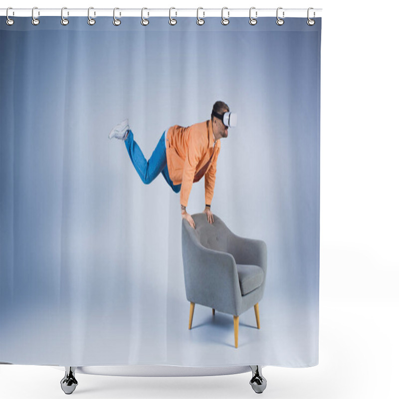 Personality  A Man In An Orange Shirt Showcases A Mesmerizing Trick On A Chair, Creating A Captivating And Artistic Display. Shower Curtains