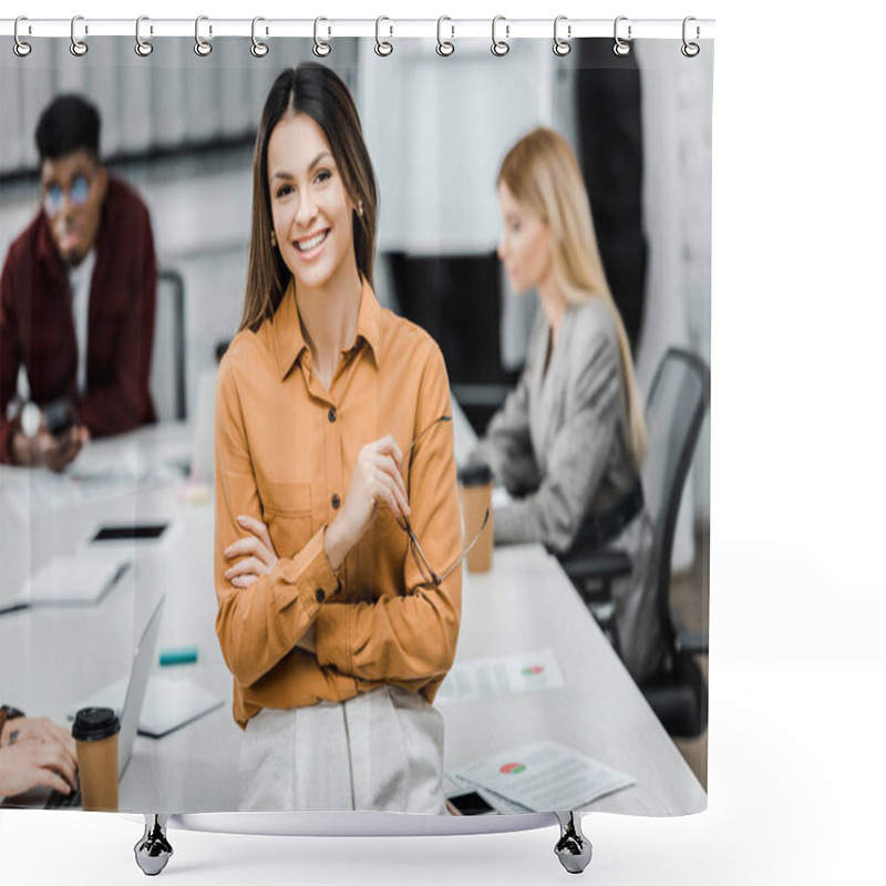 Personality  Smiling Businesswoman Looking At Camera With Multicultural Colleagues Behind In Office Shower Curtains