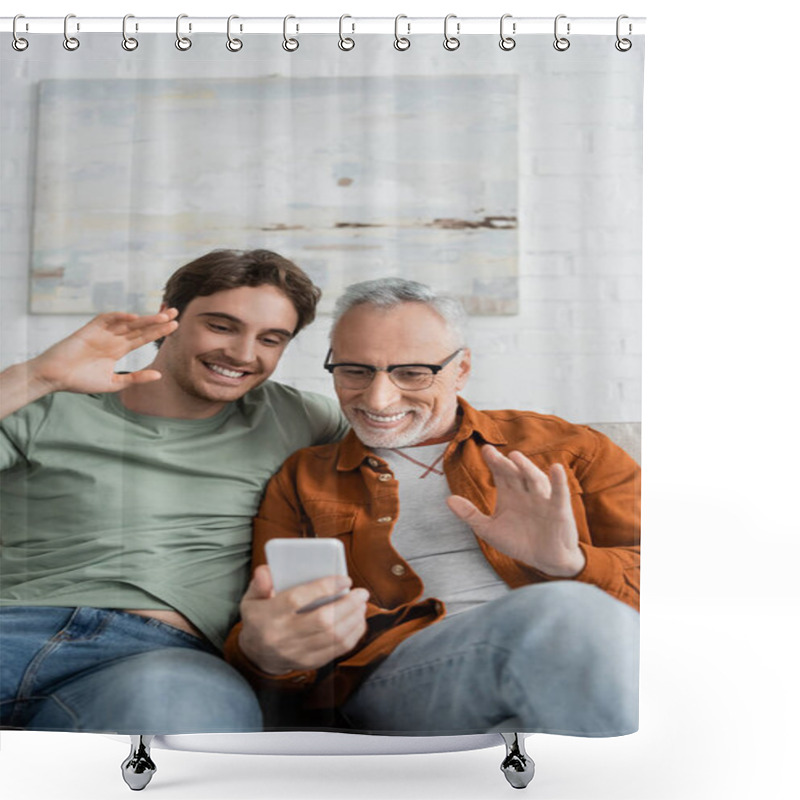 Personality  Happy Mature Man And Cheerful Son Waving Hands During Video Call On Smartphone  Shower Curtains