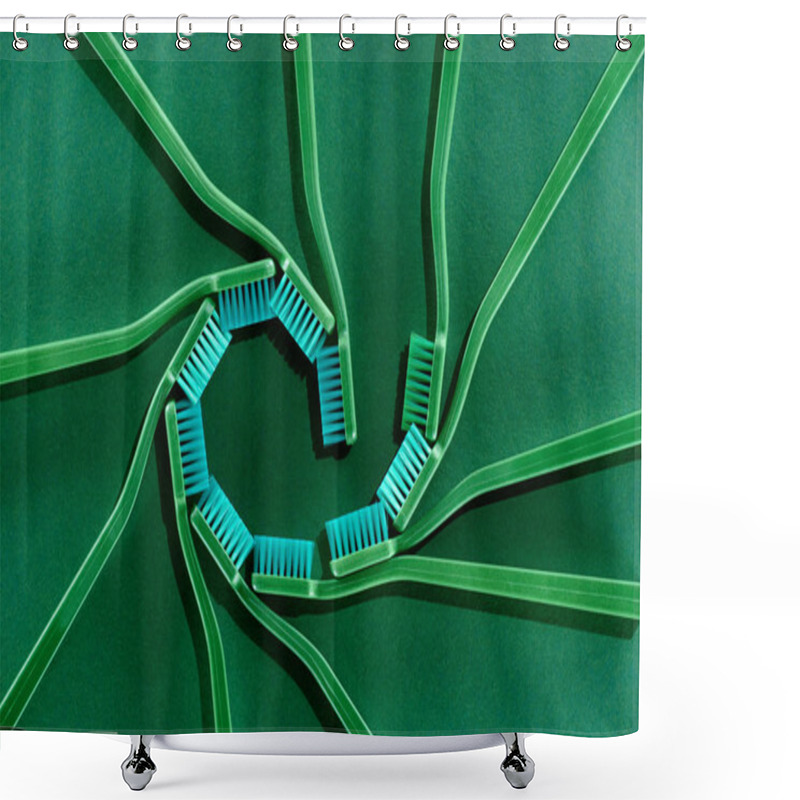 Personality  Top View Of Spiral Composition With Toothbrushes On Green Shower Curtains