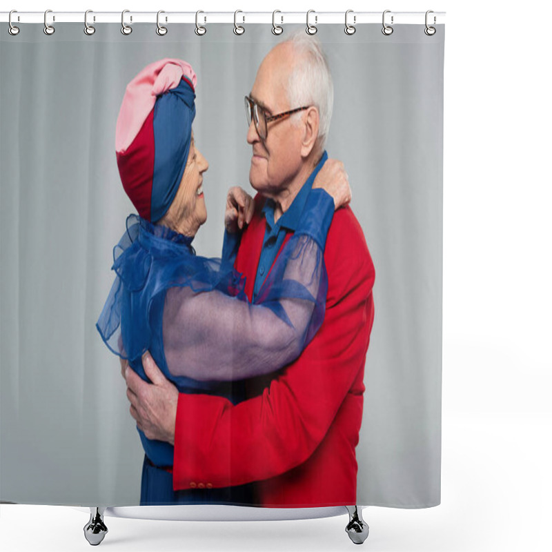 Personality  Smiling Elderly Couple In Blue Dress And Red Blazer Hugging Isolated On Grey Shower Curtains