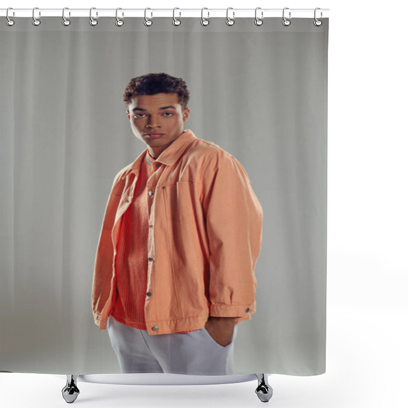 Personality  Stylish Man In Peach Shirt Standing Against Grey Wall, Showcasing His Impeccable Fashion Sense Shower Curtains