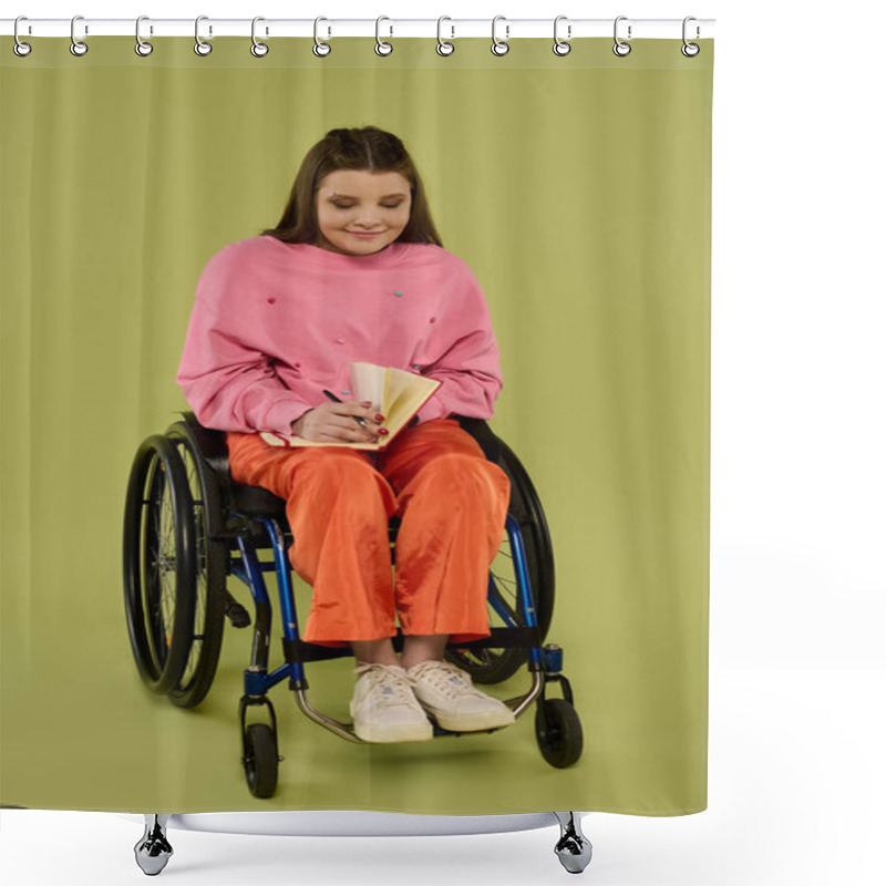 Personality  A Young Woman With Long Brunette Hair Sits In A Wheelchair In A Studio Setting, Writing In A Notebook. Shower Curtains