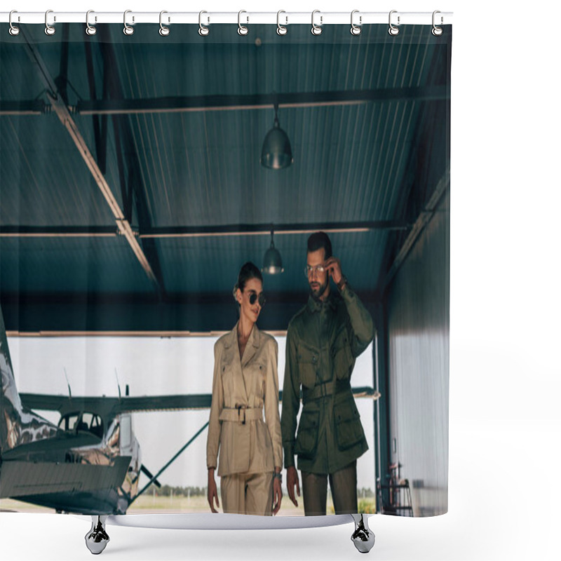 Personality  Couple In Stylish Jackets Walking Near Airplane In Hangar  Shower Curtains