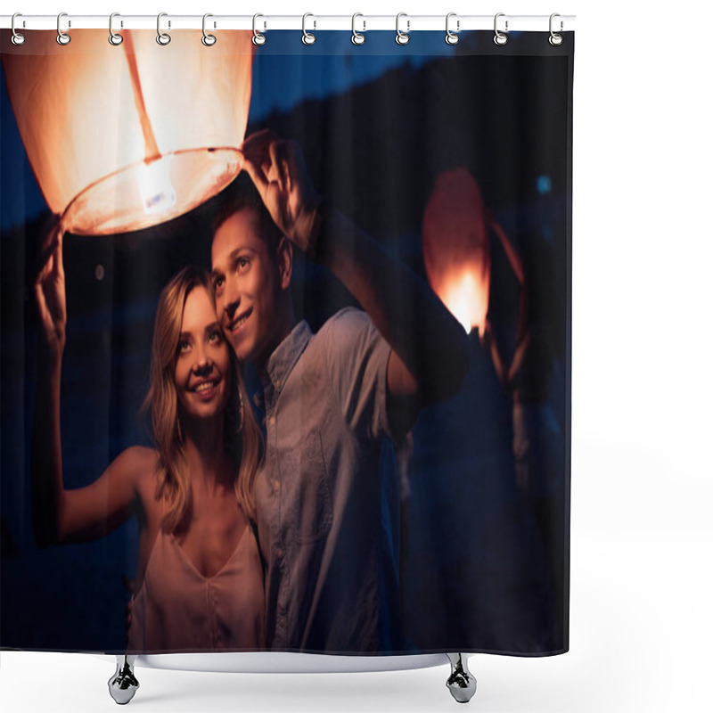 Personality  Young Couple Launching Sky Lantern On River Beach In Evening Shower Curtains