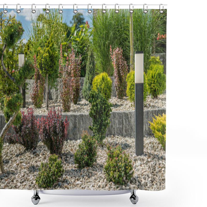 Personality  Stone Wall With Elegant Ornamental Garden Landscape Including Decorative Trees Grasses And Bushes. Shower Curtains