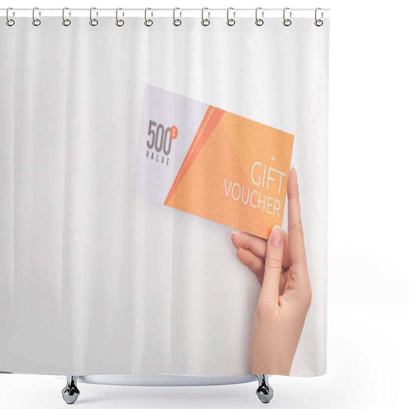 Personality  Cropped View Of Woman Holding Gift Voucher With 500 Value Lettering On White Background Shower Curtains